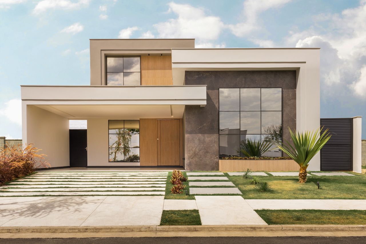 gallery-2 Contemporary house exterior with minimalist design, large windows, and landscaped front yard.